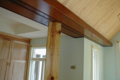 We used a combination of mahogany, ipe and pine for this custom trim. The post is 200 year old yellow pine barn material